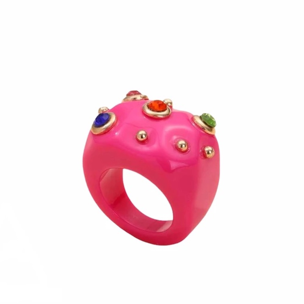 Colored resin ring with golden touch.